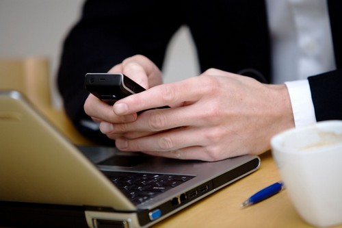 der ejer en mobiltelefon