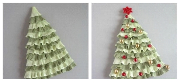 vi hænger på de lavede ornamenter dekorere juletræet